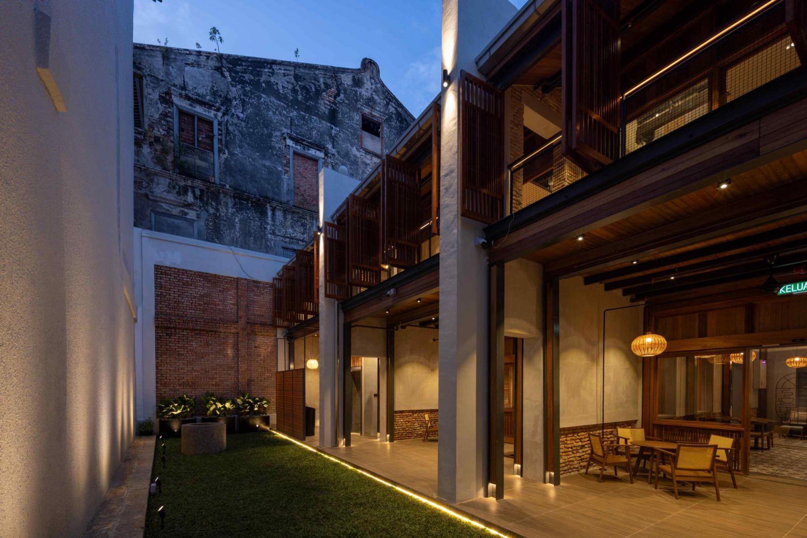 View of the three shophouses from the rear courtyard