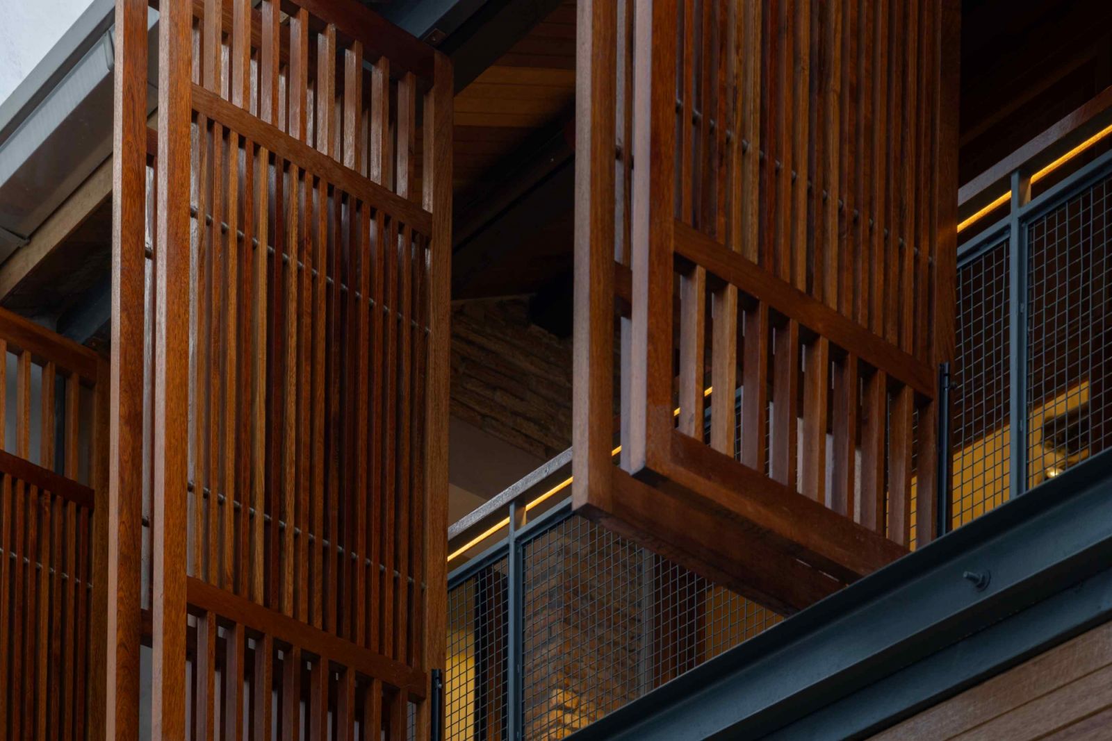A modern reinterpretation of traditional louvred timber screens typical of traditional Southeast Asian shophouses