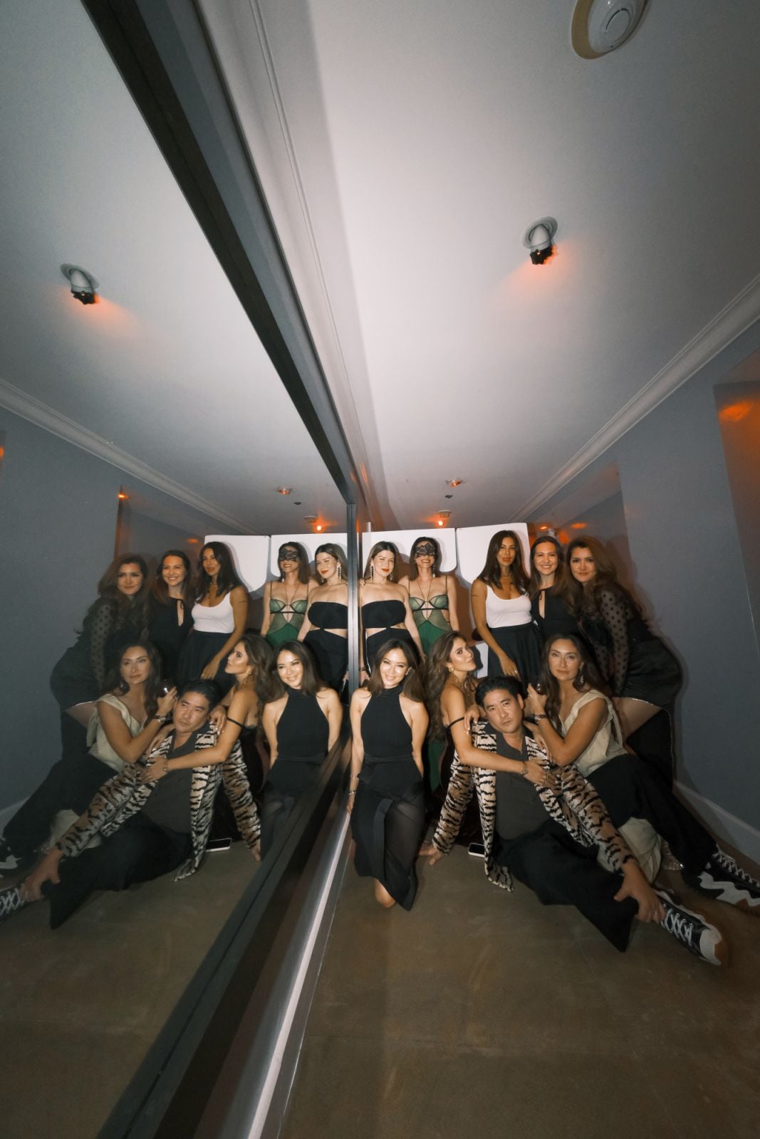 Augousti and friends strike a pose in the hallway