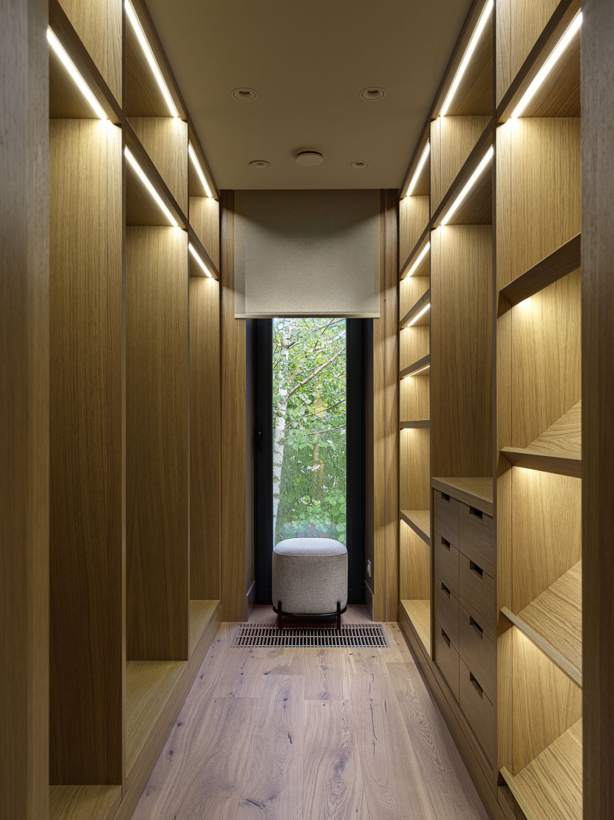 Overhead accent lighting in the walk-in closet