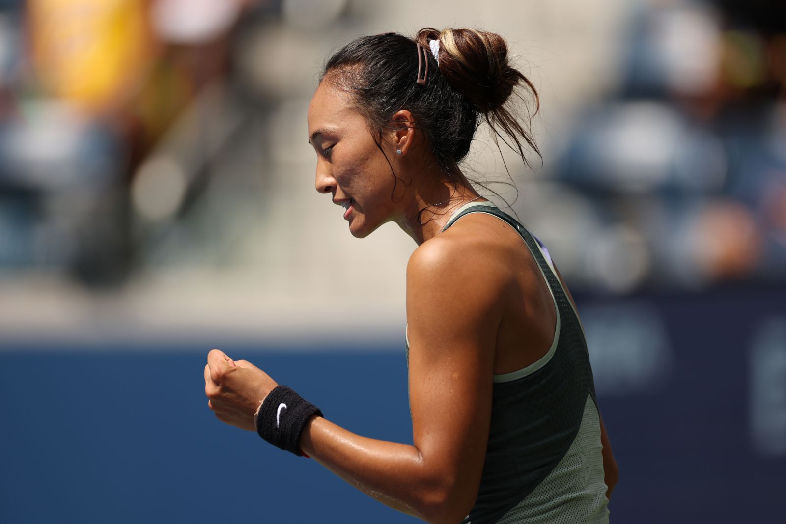 NEW YORK, NEW YORK - AUGUST 26: Qinwen Zheng of China reacts against Amanda Anisimova of the United States during their Women's Singles First Round match on Day One of the 2024 US Open at the USTA Billie Jean King National Tennis Center on August 26, 2024 in the Flushing neighborhood of the Queens borough of New York City. (Photo by Sarah Stier/Getty Images)