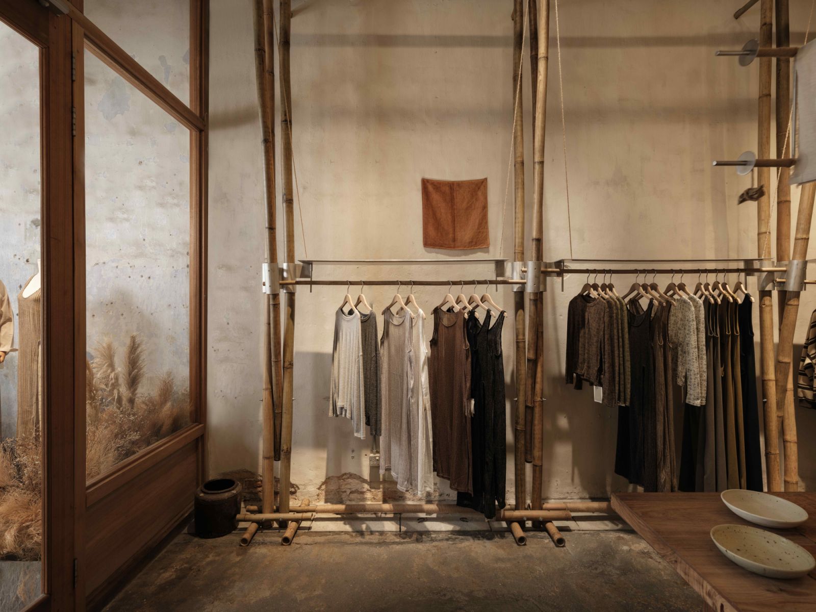 Bamboo displays and salvaged timber furnishing add a layer of artisanal touch (Photo: TWJPTO)
