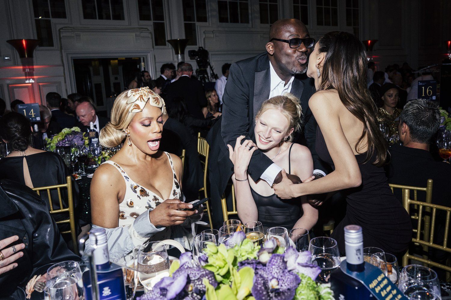 (L-R) Laverne Cox (Standing) Edward Enninful OBE and guests at The King's Trust 2024 Global Gala