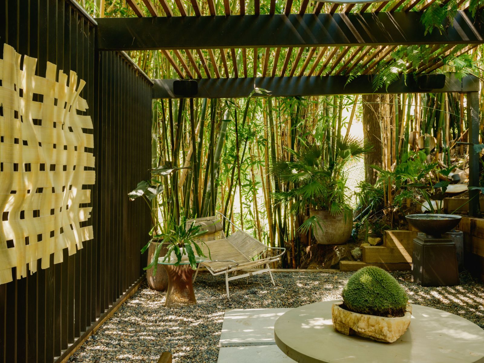 Existing mature bamboo hedges create a relaxing jungle-esque environment