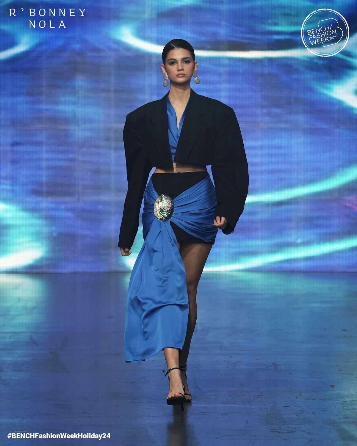 One of Gabriel's trademark motifs: a deconstructed cropped blazer (Photo: Bench)