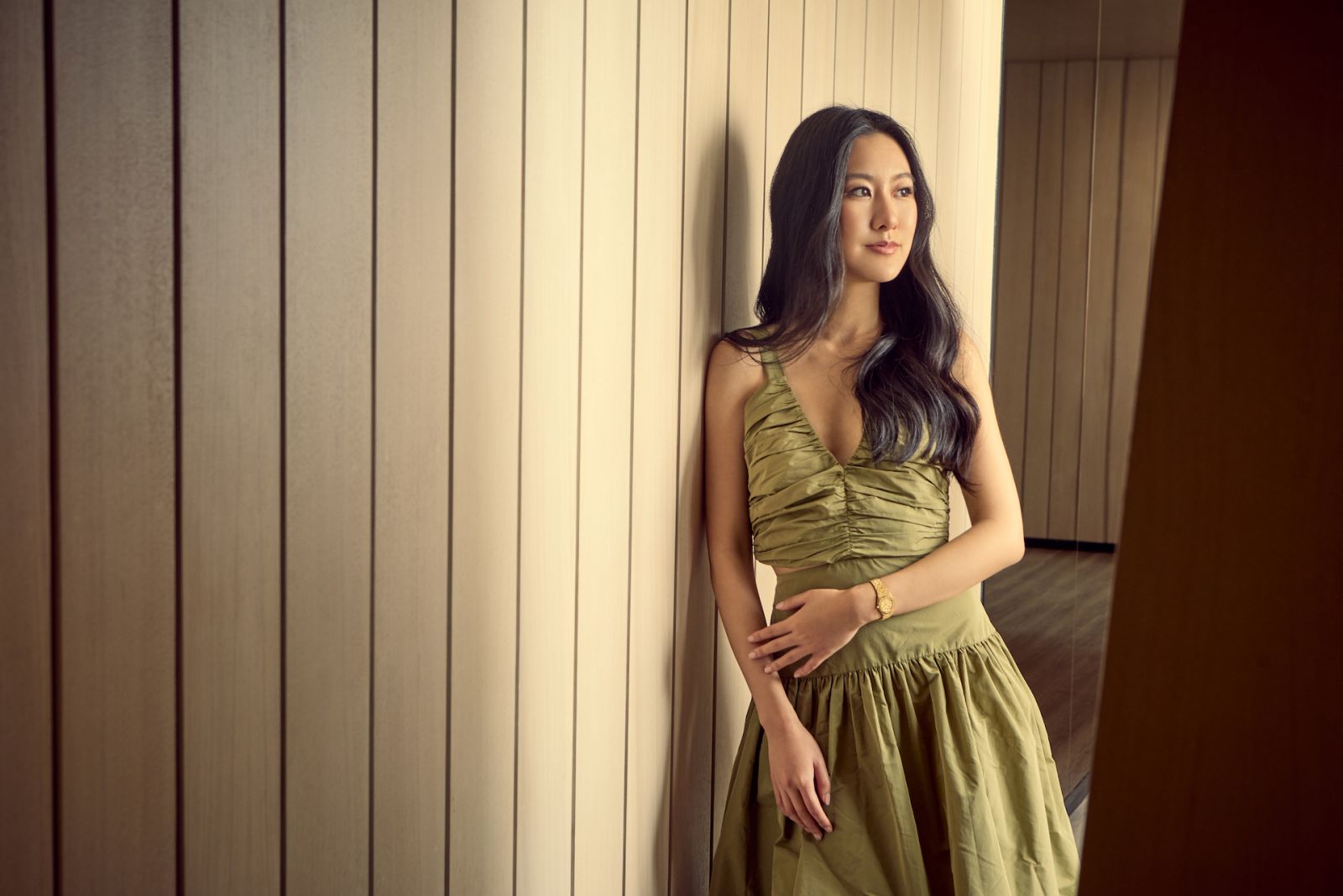 Michelle Yeoh wears Audemars Piguet Royal Oak Mini in yellow gold and outfit by Maje