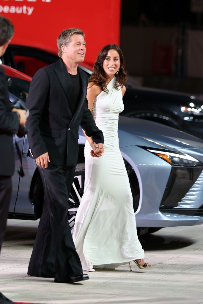 VENICE, ITALY - SEPTEMBER 01: Brad Pitt and Ines de Ramon attend the "Wolfs" red carpet during the 81st Venice International Film Festival on September 01, 2024 in Venice, Italy. (Photo by Daniele Venturelli/WireImage)
