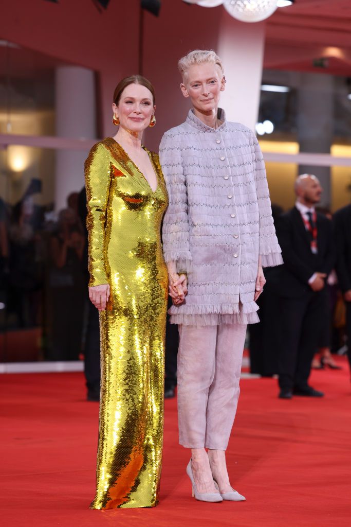 VENICE, ITALY - SEPTEMBER 02: (L-R) Julianne Moore and Tilda Swinton attend the "The Room Next Door" red carpet during the 81st Venice International Film Festival on September 02, 2024 in Venice, Italy. (Photo by Stefania D'Alessandro/WireImage)