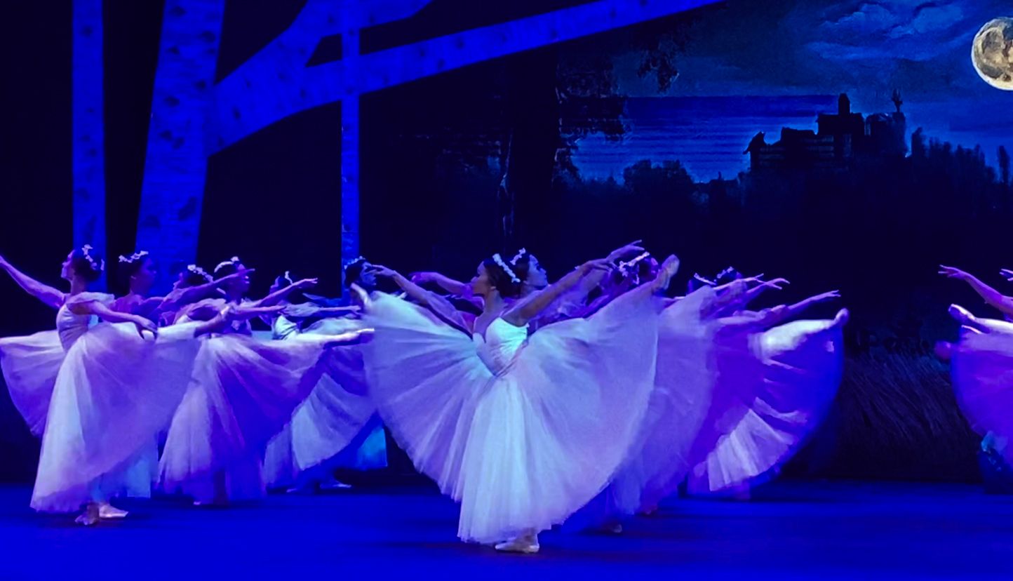 The ethereal white costumes and minimalist set design enhance the haunting elegance of the Wilis in Ballet Manila's ‘Giselle’