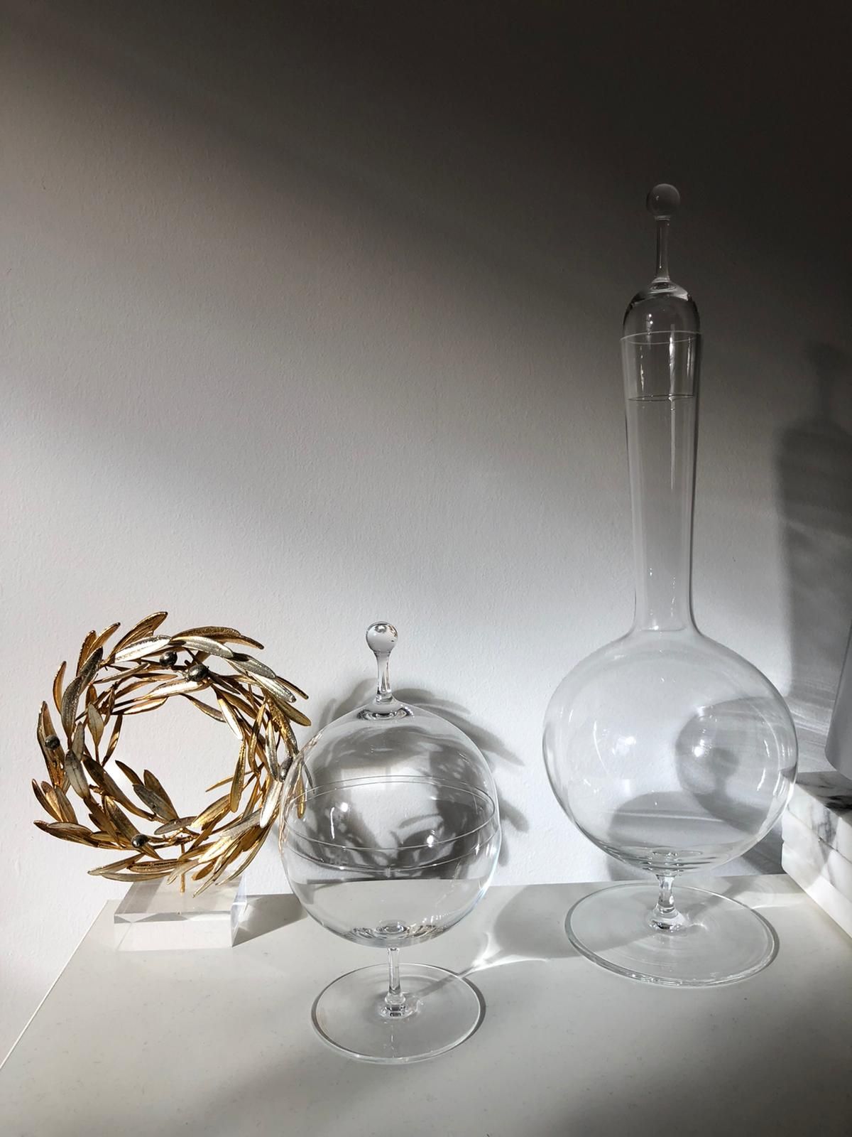 A custom console table and glassware curated for a London client