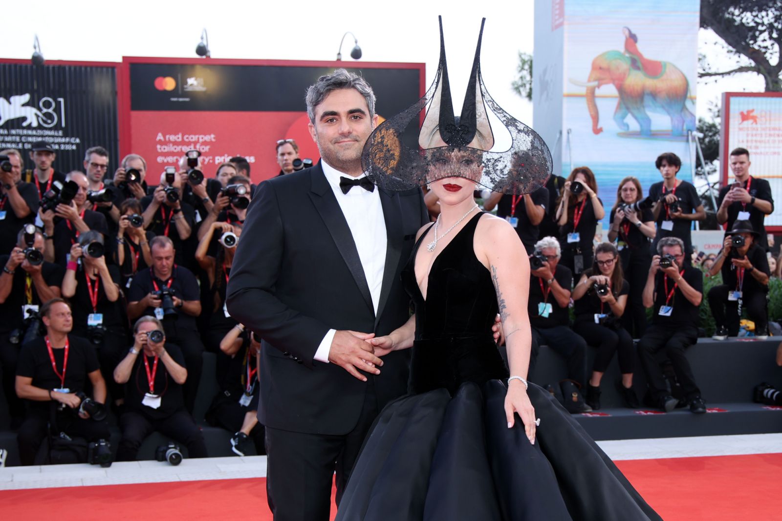 VENICE, ITALY - SEPTEMBER 04: Michael Polansky and Lady Gaga attend the "Joker: Folie à Deux" red carpet during the 81st Venice International Film Festival at Sala Grande on September 04, 2024 in Venice, Italy. (Photo by Daniele Venturelli/WireImage)