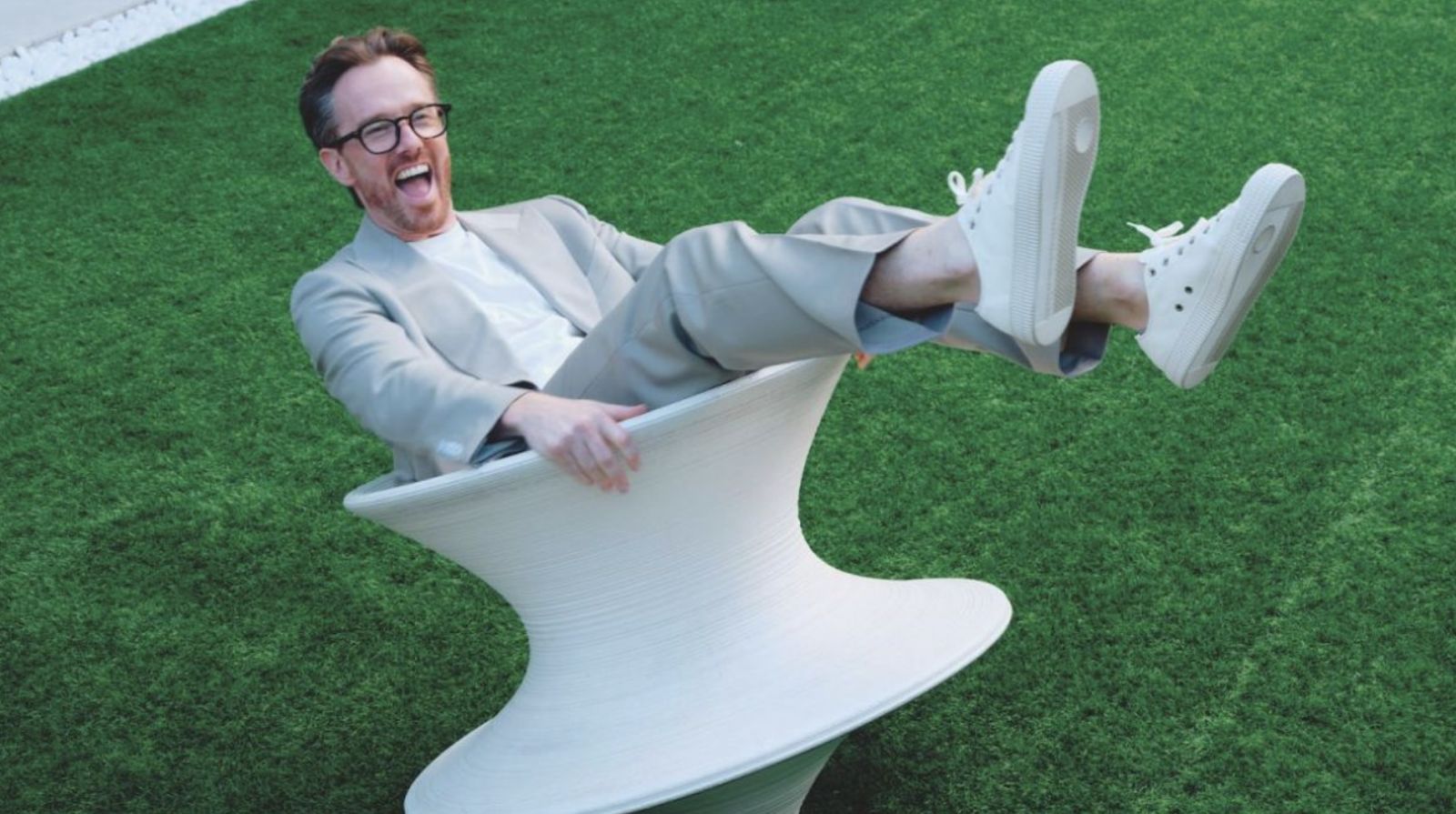 Simon Wilson, of Fork Lore fame, wears IWC Schaffhausen watch, Suitsupply outfit and sneakers (Photo: Ivan Wong/Tatler Hong Kong)