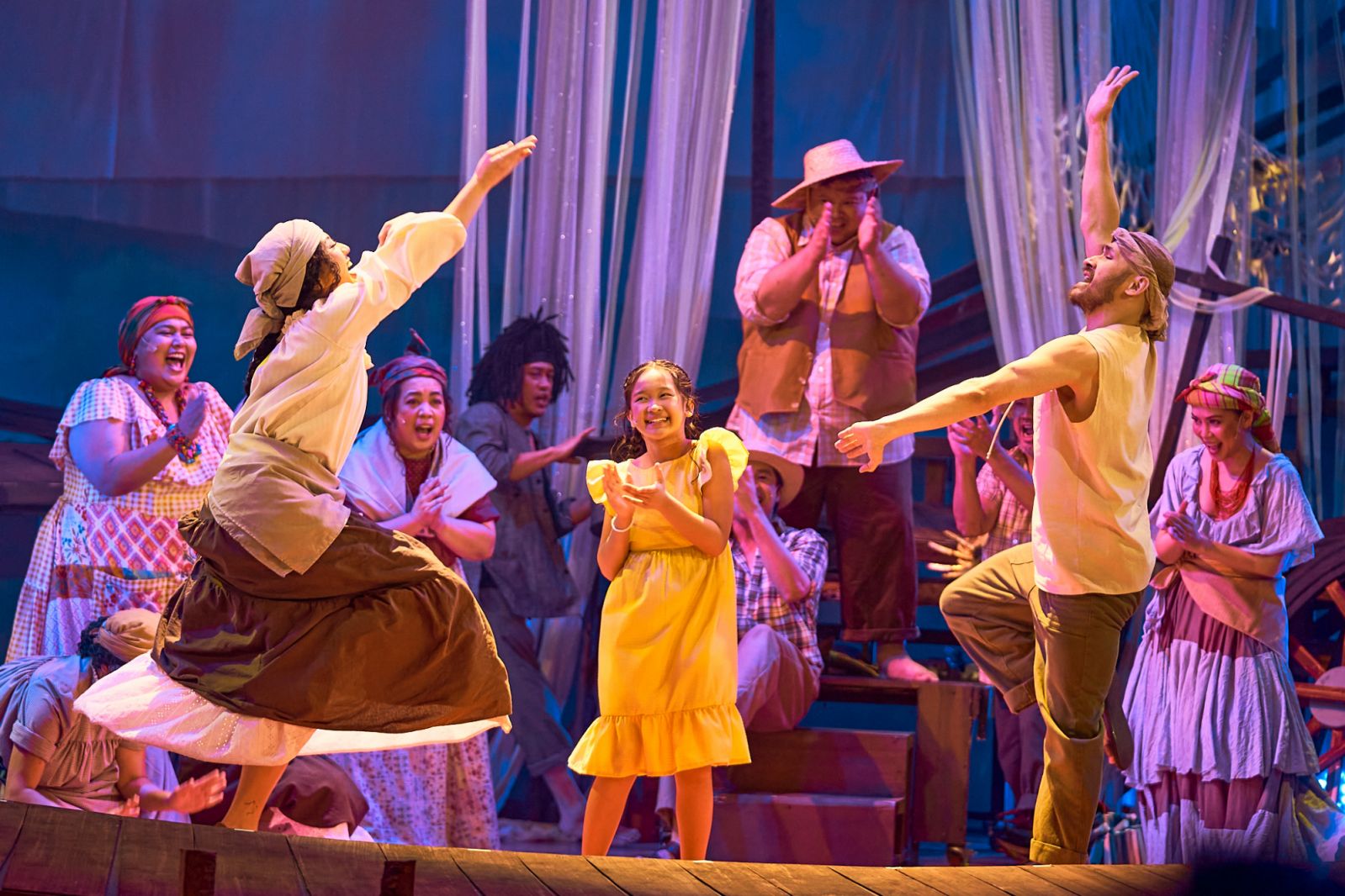 The cast of ‘Once on This Island’ dancing with Little Ti Moune