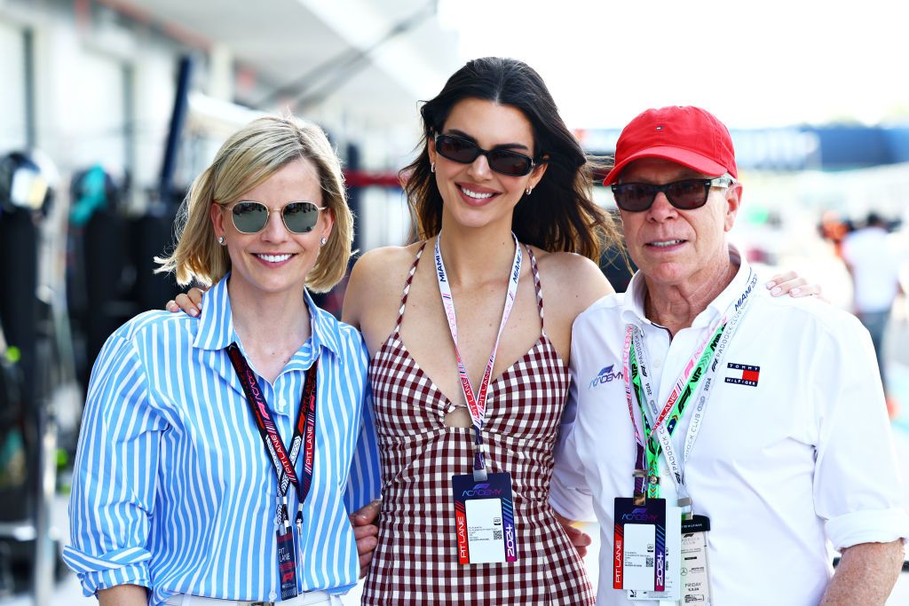 MIAMI, FLORIDA - MAY 03: Susie Wolff, Managing Director of F1 Academy, Kendall Jenner and Tommy Hilfiger pose for a photo in the Pitlane during practice prior to Round 2 Miami of the F1 Academy at Miami International Autodrome on May 03, 2024 in Miami, Florida. (Photo by Mark Thompson/Getty Images)