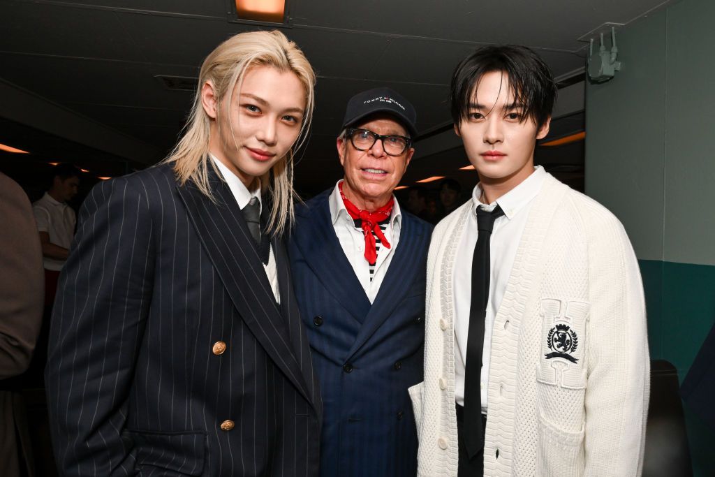 Felix, Tommy Hilfiger and Lee Know at Tommy Hilfiger RTW Spring 2025 as part of New York Ready to Wear Fashion Week held aboard the Staten Island Ferry the MV John F. Kennedy on September 8, 2024 in New York, New York. (Photo by Gilbert Flores/WWD via Getty Images)