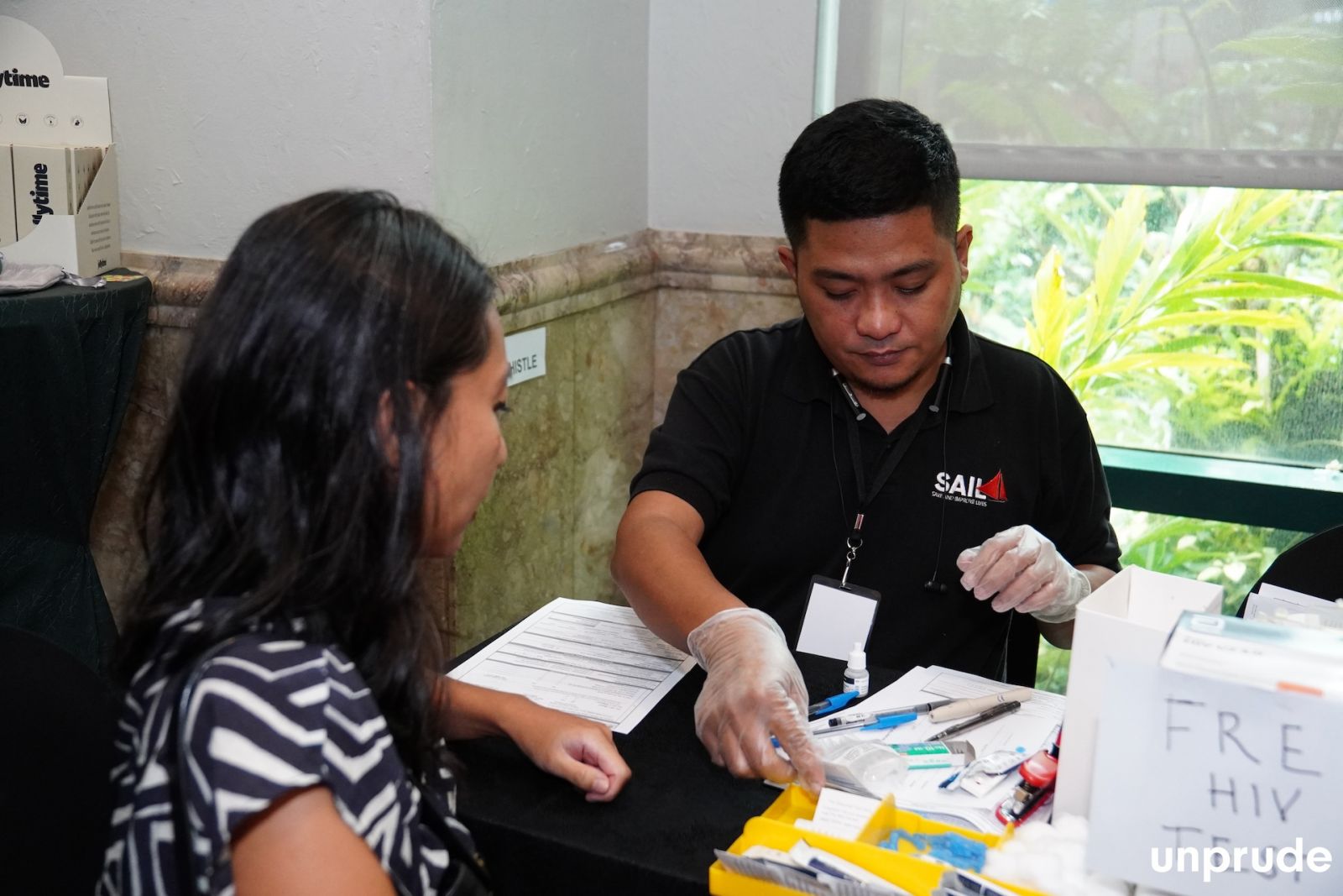 HIV testing at the SAIL Clinics booth