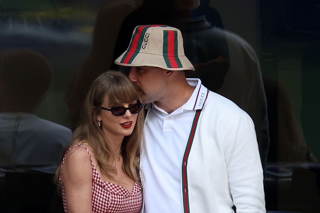 NEW YORK, NEW YORK - SEPTEMBER 08:  Singer-songwriter Taylor Swift and Travis Kelce of the Kansas City Chiefs attend the Men's Singles Final match between Taylor Fritz of the United States and Jannik Sinner of Italy on Day Fourteen of the 2024 US Open at USTA Billie Jean King National Tennis Center on September 08, 2024 in the Flushing neighborhood of the Queens borough of New York City. (Photo by Jamie Squire/Getty Images)