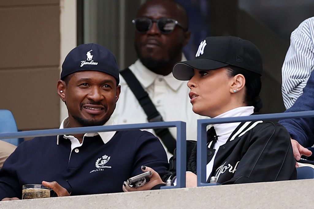 NEW YORK, NEW YORK - SEPTEMBER 08: Singer Usher and wife Jen Goicoechea attend the Men's Singles Final match between Taylor Fritz of the United States and Jannik Sinner of Italy on Day Fourteen of the 2024 US Open at USTA Billie Jean King National Tennis Center on September 08, 2024 in the Flushing neighborhood of the Queens borough of New York City. (Photo by Matthew Stockman/Getty Images)