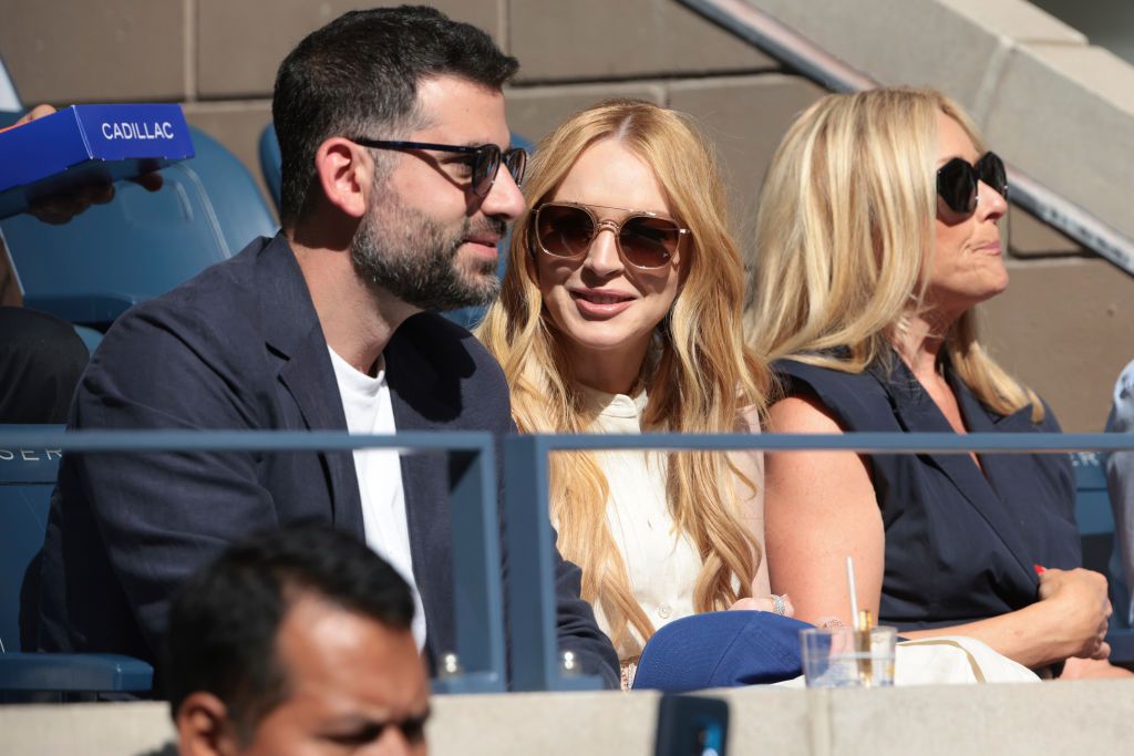 FNEW YORK, NEW YORK - SEPTEMBER 8: Bader Shammas and Lindsay Lohan, Jane Krakowski attend the men's final on day fourteen of the 2024 US Open Tennis Championships at the USTA Billie Jean King Tennis Center on September 8, 2024 in Flushing Meadows, Queens, New York City. (Photo by Jean Catuffe/GC Images)