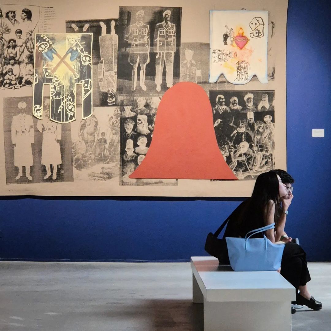 Manuel Ocampo’s ‘If All You Are Is A Nail Then Everything Looks Like A Hammer Version 2’, a blend of screenprint, relief cast paper, and handpainted flags on canvas (Photo: Instagram / Metropolitan Museum of Manila)
