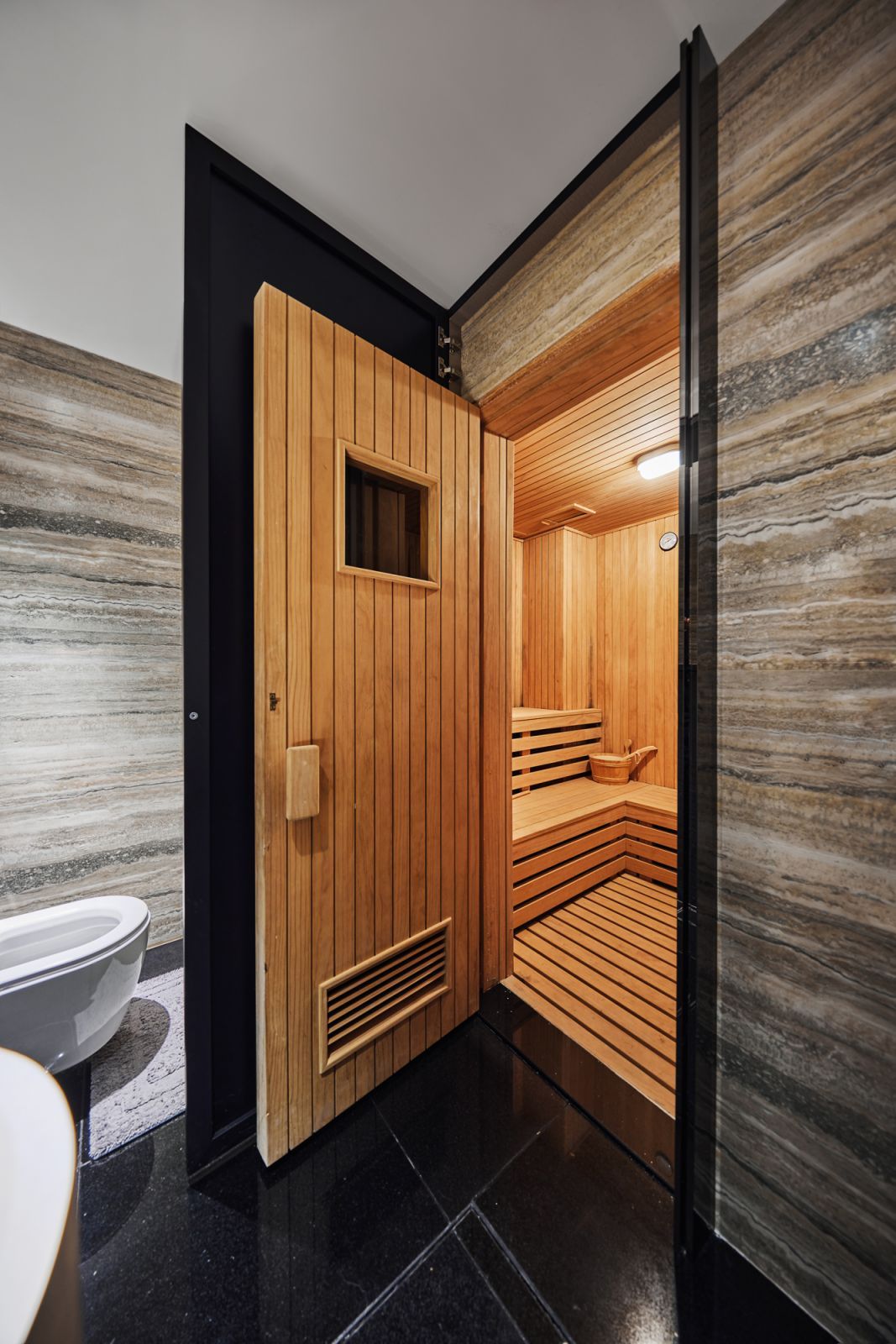 A hidden sauna in a neurosurgeon’s Good Class Bungalow