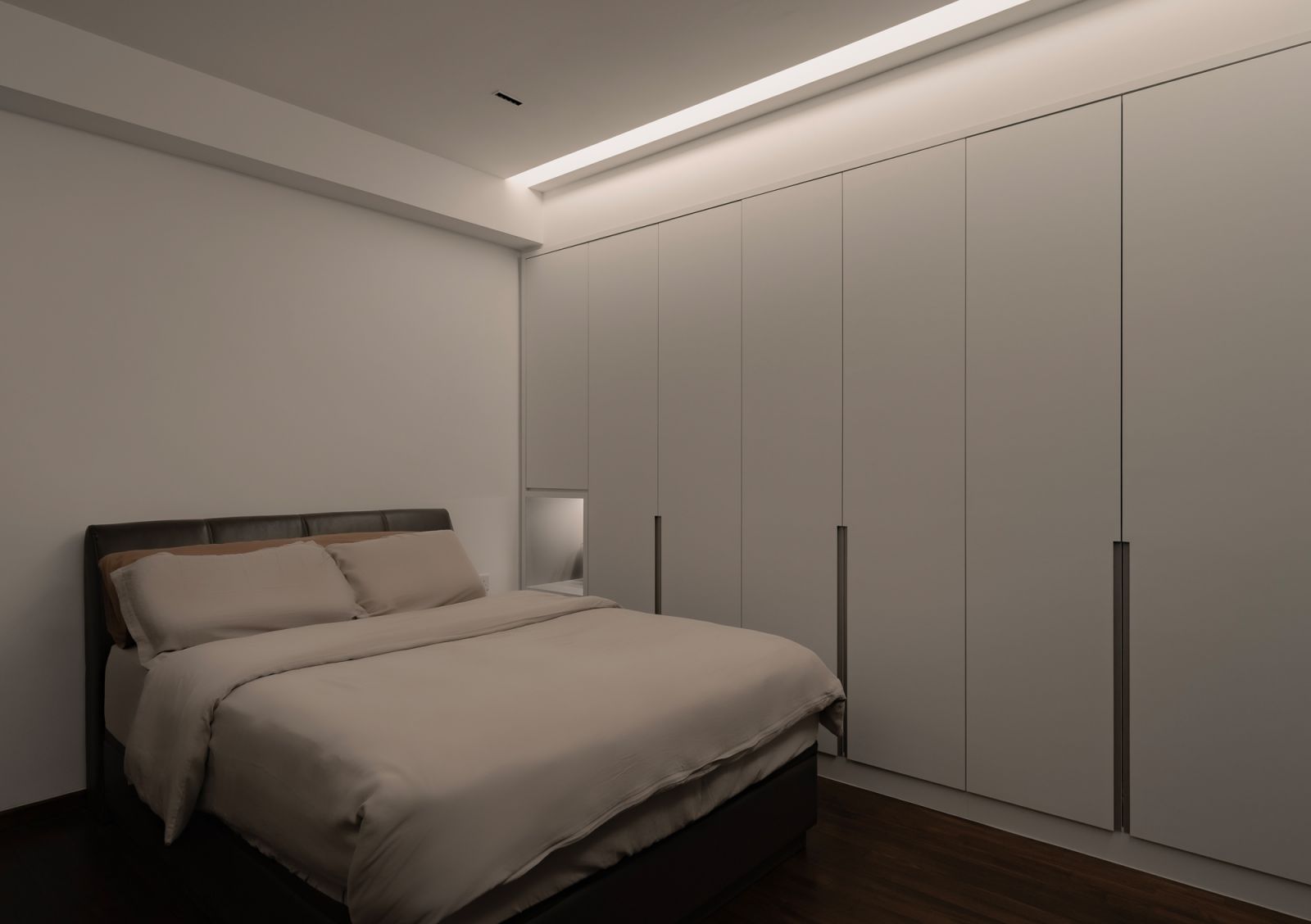 Soft illumination makes the bedroom feel cosy while increasing functionality