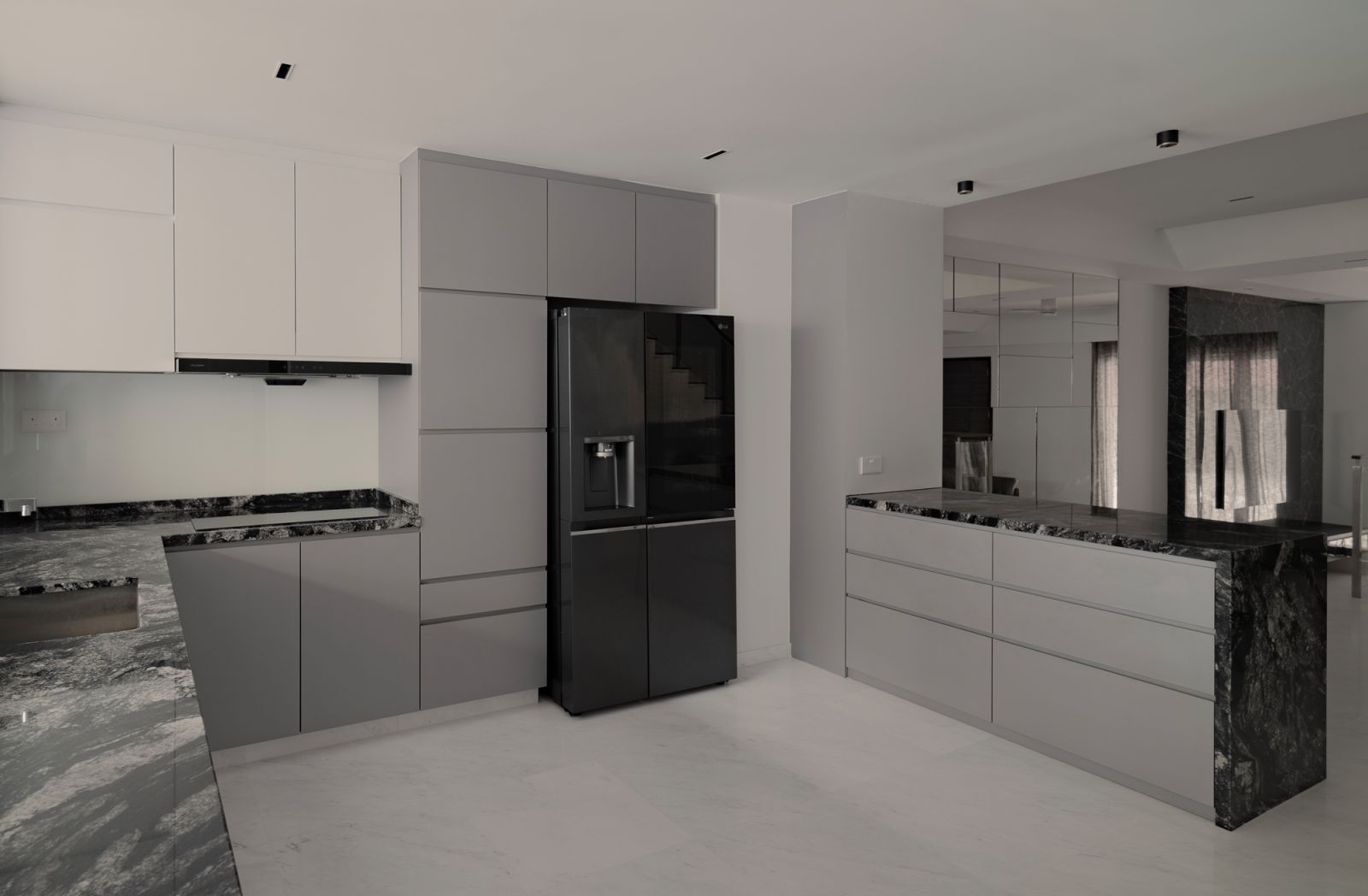 The kitchen maintains the same palette as the rest of the Changi home, ensuring cohesiveness