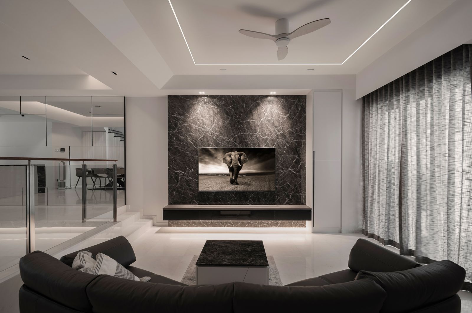 The living area in an inter-terrace house at Changi, designed by Jia Studios