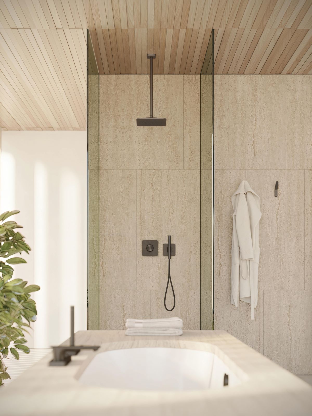 Shower and bath area, fully fitted with fixtures by AXOR and Antonio Citterio (Photo: Courtesy of AXOR)