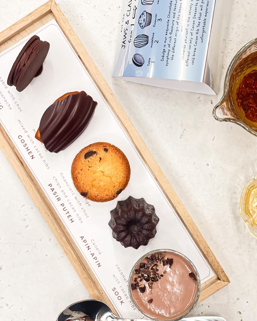 A tasting flight of chocolate treats (Photo: Instagram / @choc.room & @jawsclawschocolate)