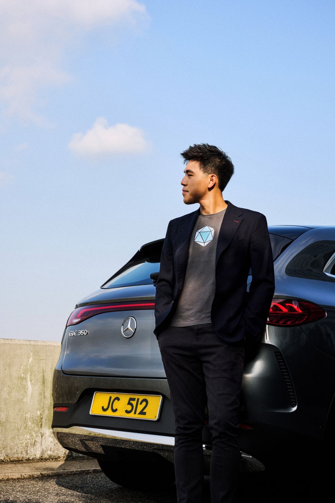 Siu with the Mercedes-Benz EQE SUV (Photo: Zed Leets/Tatler Hong Kong)