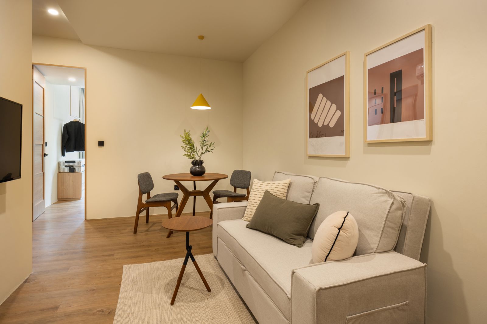 The living and dining space in the Alma House Two-Bedroom Executive Suite