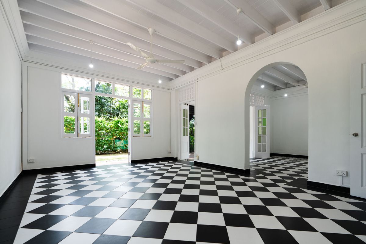 the interior of the black-and-white house at 107 Holland Road, which was designed by pioneering local architect Wong Foo Nam