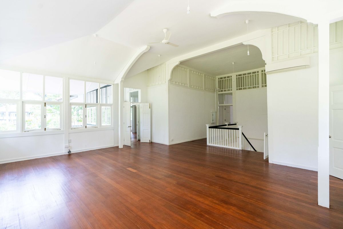 The whitewashed raised living room of the black-and-white house at 9 Goodwood Hill