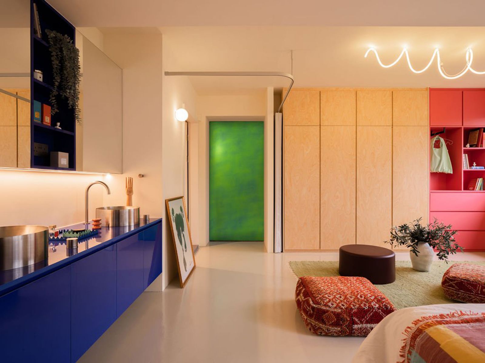 Residential interiors by Knock Knock Studio, featuring a custom suspended track system