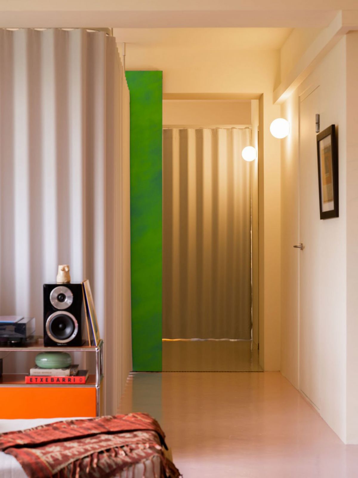 Another view of the Knock Knock Studio project featuring the Coesa ripple fold blackout curtains
