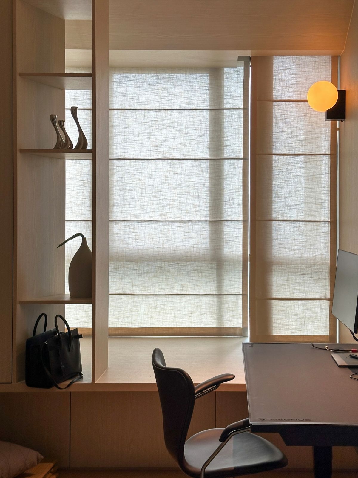 Japandi blinds from Coesa, crafted out of sustainable linen, lend this study area a cosy vibe