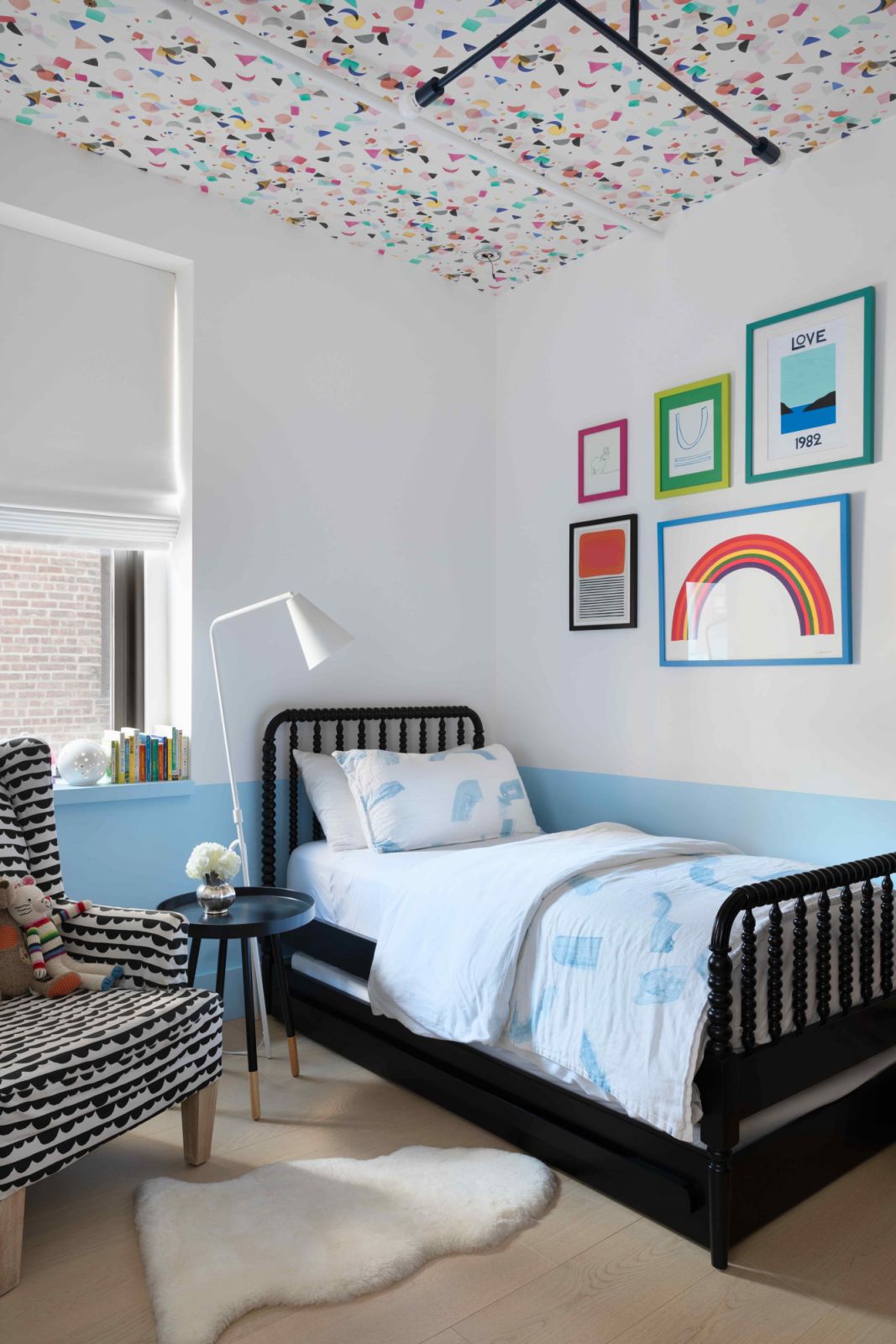 The daughter’s room with colourful splats on the ceiling