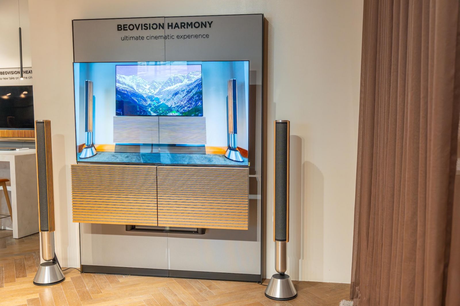 97” Beovision Harmony: 4K OLED TV providing an unparalleled cinematic experience, and Beolab 28: Slim wireless stereo speakers enhancing home entertainment with high-resolution sound