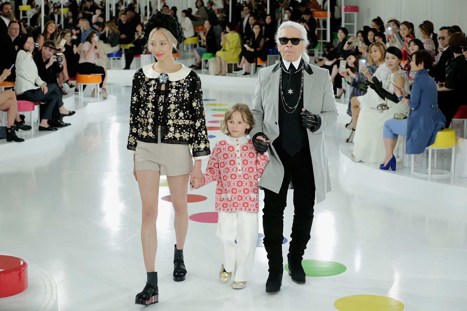 SEOUL, SOUTH KOREA - MAY 04: (L-R) Model Soo Joo (Soojoo), Chanel Artistic Director Karl Lagerfeld (R) and his godson Hudson (C) walk in a design by Chanel during the Chanel 2015/16 Cruise Collection on May 4, 2015 in Seoul, South Korea. (Photo by Han Myung-Gu/Getty Images)