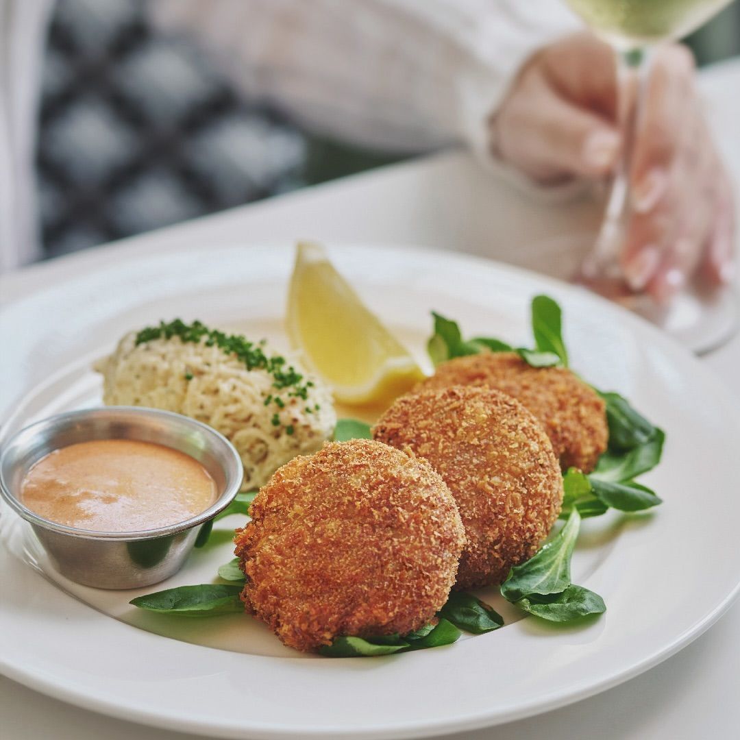 A plate of crab cakes (Photo: Instagram / @culina_kualalumpur)