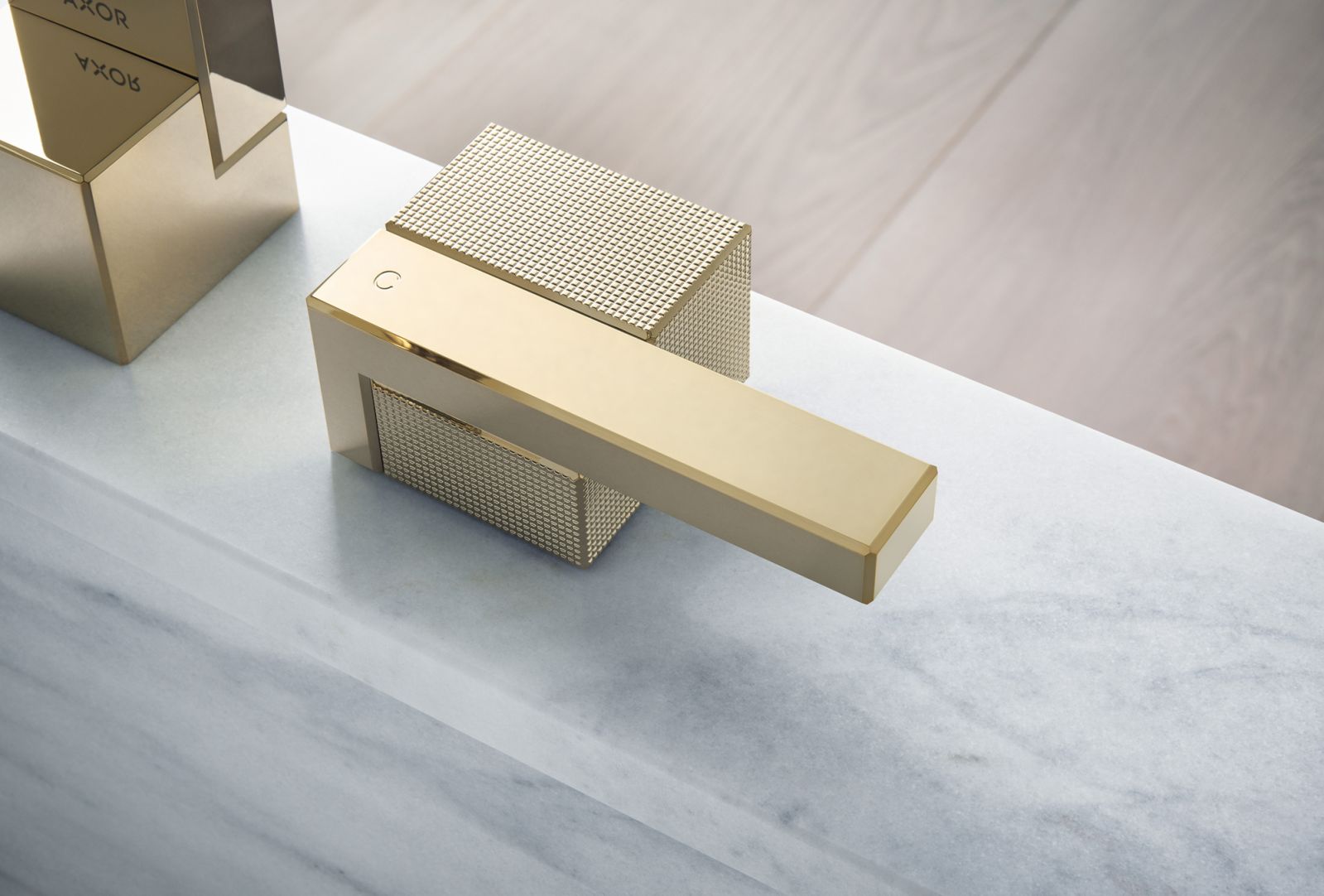 The Axor Edge Faucet in polished bronze by Hansgrohe