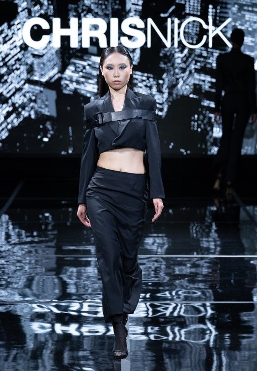 A look featuring a cropped tuxedo jacket styled with a belt (Photo: Mannyl Lanura)