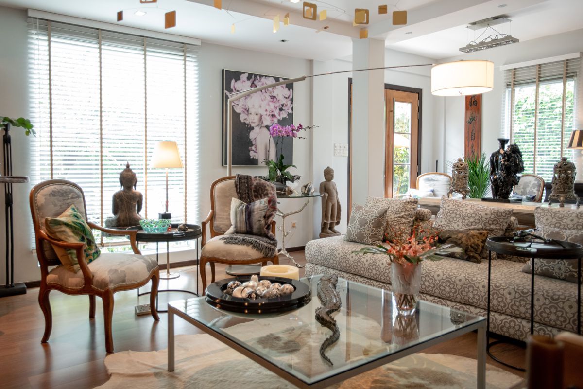 Isabelle Miaja’s living room is dotted with art pieces collected from around the world