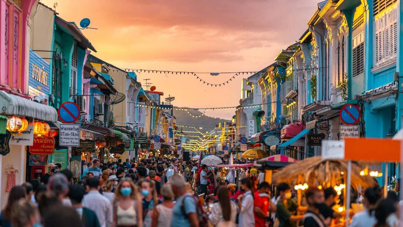 Street view of Phuket Old Town night market at sunset in Phuket
