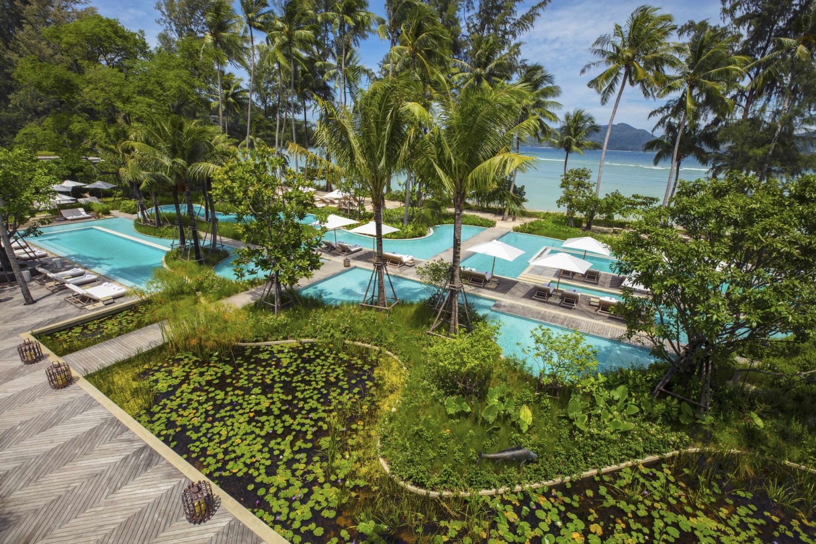 The main pool overlooking the sea at Rosewood Phuket
