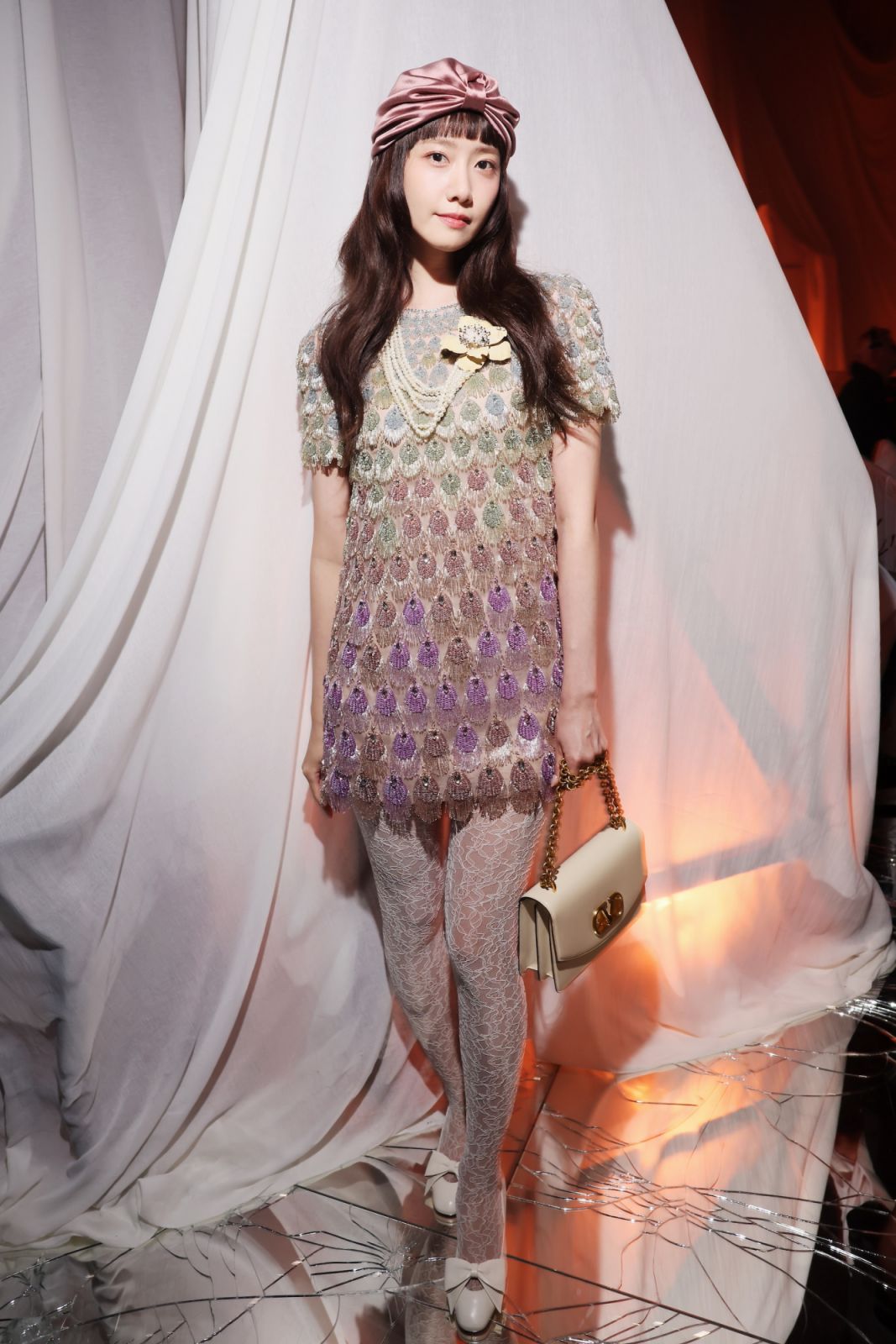 PARIS, FRANCE - SEPTEMBER 29: Yoona Lim arrives at Valentino Pavillon des Folies Show as part of the Paris Fashion Week on September 29, 2024 in Paris, France. (Photo by Victor Boyko/Getty Images for Valentino)