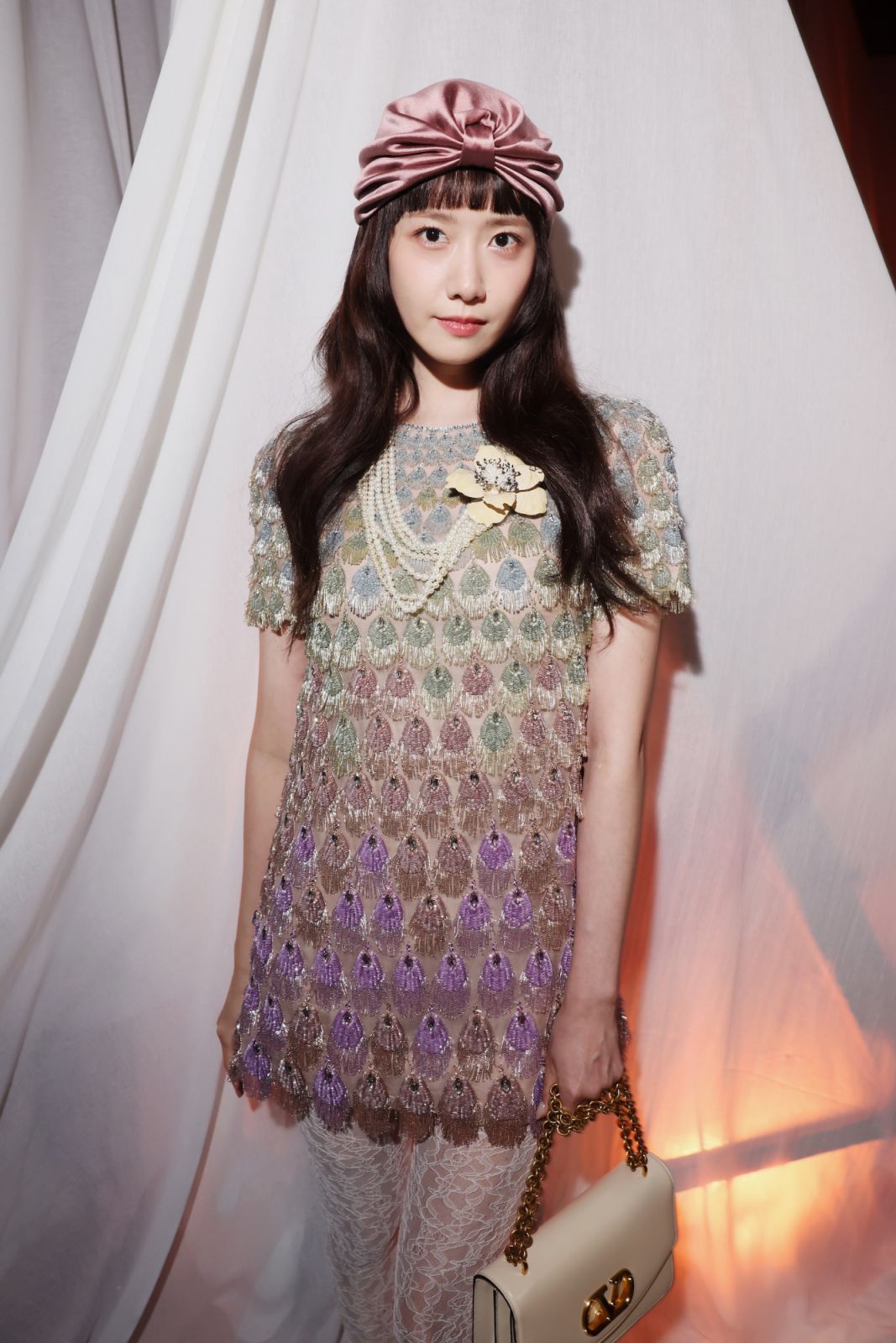 PARIS, FRANCE - SEPTEMBER 29: Yoona Lim arrives at Valentino Pavillon des Folies Show as part of the Paris Fashion Week on September 29, 2024 in Paris, France. (Photo by Victor Boyko/Getty Images for Valentino)
