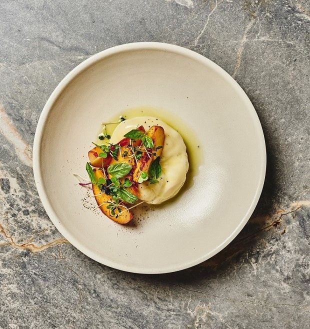 Burrata, peach and white balsamic at Anvil by chef Josh Boutwood