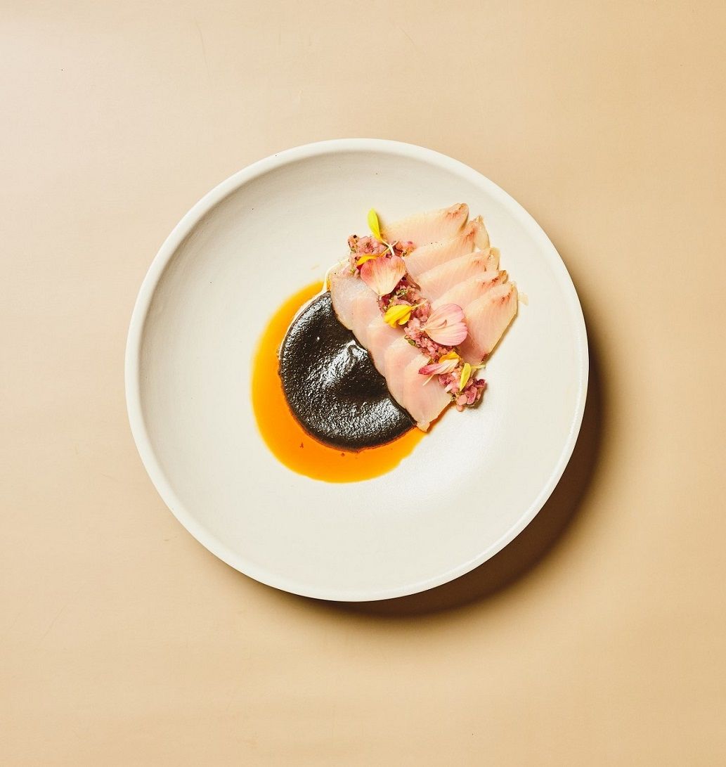 Hamachi, black olives, chilli oil at Anvil by chef Josh Boutwood